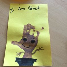 a child's handprint on a piece of paper with the words i am groot