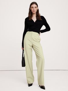 We cut this pant for a sleek and sharply-tailored fit, opting for a barely-there Hollywood waistband and darts at the back waist to create a clean look that's also ultra-comfortable.  For fabric, we reached for our Siena Italian wool—a customer favorite for its all-weather weight and hint of stretch.  High Rise Modern Straight: High rise (12") with a relaxed fit through the thighs and a straight leg.  Full length.  Fabric from Italy's Marzotto mill.  Responsible Wool Standard Certified: This global standard protects the sheep that supply the wool for this garment as well as the land they graze, working to make it better for the environment and the sheep.  Zip fly with hook-and-bar closure.  Front and back pockets.  Unlined.  High Rise Modern Straight: High rise (12") with a relaxed fit thr Flannel Pants, Petite Shorts, Wool Flannel, Wool Pants, Pants Straight, Bottom Clothes, Straight Pants, Bottoms Pants, Capsule Wardrobe