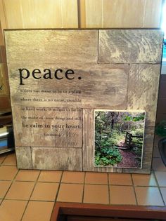 a wooden frame with a poem written on it in front of a kitchen counter top