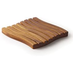 a wooden tray with wavy lines on it