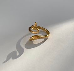 18K GOLD SERPENT SNAKE RING also available in silver Materials: Stainless Steel, 18K gold plated, CZ stone Additional Info: Hypoallergenic High Polished Eco-friendly: We use sustainable metals and recycled gold Tarnish resistant and waterproof: No worries about color fading here. With proper care, this piece will last for years! See our care section for more details. 1-year warranty All of our gold jewelry is plated with recycled gold. Each piece is coated using the highest grade technique, whic Serpent Snake, Snake Ring, Waterproof Jewelry, Gold Snake, Recycled Gold, Cz Stone, Gold Plated Jewelry, Jewelry Plate, 1 Year