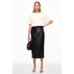 Black (100% Polyurethane). Skirts. Front Zipper Fly With Button Closure. Shoulder to Hemline Length: 31". Imported. Vegan Leather Skirt, Rent The Runway, For All Mankind, 7 For All Mankind, Front Zipper, Leather Skirt, Vegan Leather, Zipper, Skirt