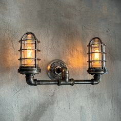 two light fixtures are attached to the wall