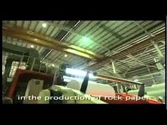 there is an image of a factory with the words in the production of rock paper