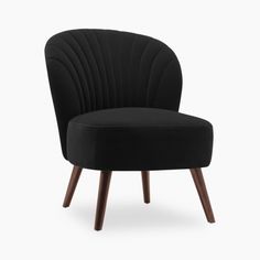 an upholstered black chair with wooden legs and a round backrest, on a white background