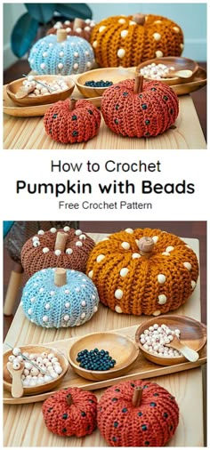 crochet pumpkins with beads are sitting on a table