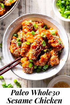 a bowl full of sesame chicken with chopsticks in it and the words pale whole sesame chicken