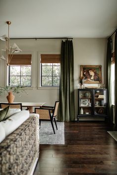 the living room is clean and ready to be used as a dining room or office