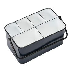 a black and white container with four compartments