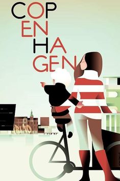 a woman riding a bike down a street next to a tall building with the words cop en ah gen on it