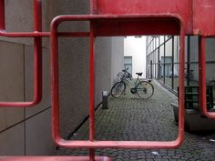 there is a bike that is parked in the street