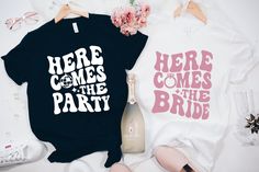 two shirts that say here comes the party and here comes the bride