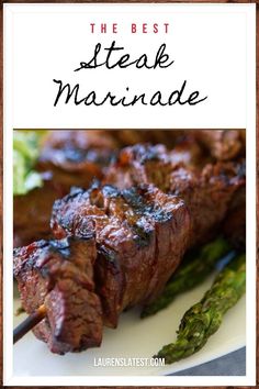 steak and asparagus on a white plate with the words, the best steak marinade