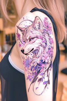 a woman with a tattoo on her arm has a wolf and flowers painted on it