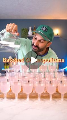 a man pouring drinks into wine glasses on top of a bar with the caption, bartender cripplians