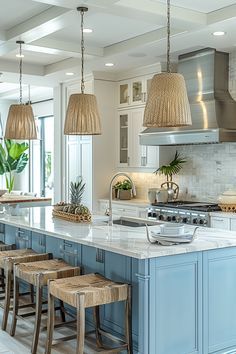 a kitchen filled with lots of counter top space and wooden stools next to an island