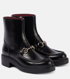 Horsebit leather ankle boots in black - Gucci | Mytheresa Boots Men Outfit, Gucci Boots, Mid Heels Pumps, Gucci Horsebit, Mid Heel Sandals, Designer Pumps, Ankle Boots Flat, Kitten Heel Pumps, Evening Shoes