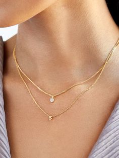 NO WAIT TIME: This product is ready to ship and requires no extra wait time. The perfect solution for when you need the perfect, personalized gift quick (or simply can't wait to get your new piece). An initial necklace is an accessory that everyone needs in their wardrobe. This petite piece features a tiny gold letter on a cable chain, adding something both dainty and sleek to your stack. Choose your initial or that of a loved one, or stack a few to represent your family. Not to mention, this pi Jewelry With Initials, Stacked Necklaces Gold Dainty, Oak And Luna Initial Necklace, Staple Gold Jewelry, New Mom Necklace, Letter A Jewelry, Push Present Necklace, Classy Everyday Jewelry, Initial Necklace Stack