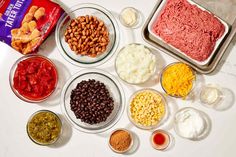 the ingredients for this recipe include beans, corn, meats, and other foods