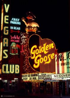 the golden goose sign is lit up at night in las vegas, n y c