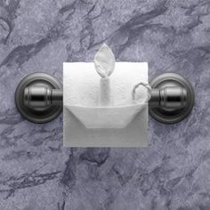 a toilet paper holder with a tissue dispenser attached to it on a marble wall