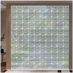 an image of a glass block wall in the living room or dining room that looks like it is made out of plastic bottles