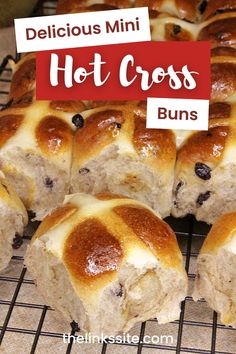 hot cross buns on a cooling rack with the words delicious mini hot cross buns