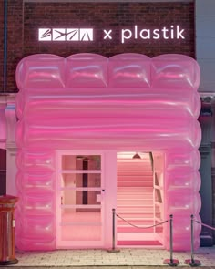 an inflatable entrance to a pink store