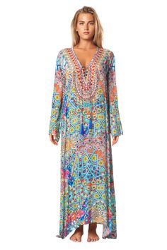 La Moda's trendy and effortless Day Dreamer Long Dress Boho Maxi Caftan can be worn as a gorgeous dress on its own or as the perfect cover-up for when you’re lounging poolside. The playful floral print in soft Viscose Silk fabric effortlessly add a touch of boho flair to any warm-weather look. Check more of La Moda's exclusive Shirred Maxi Dresses in beautiful Summer and Boho prints. High End Bohemian Resort Wear Wholesale. La Moda Bohemian Caftans are a flirty addition to your poolside ensemble Boho Print Maxi Kaftan For Beach Cover-up, Bohemian Kaftan With Boho Print For Beach Cover-up, Resort Beach Cover-up Maxi Length Kaftan, Multicolor Bohemian Maxi Length Cover-up, Bohemian Kaftan With Vibrant Print For Beach Cover-up, Boho Maxi, Beautiful Summer, Resort Wear, Silk Fabric