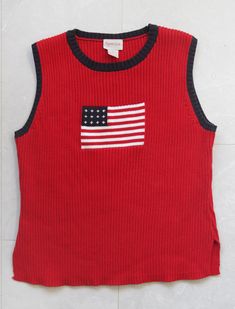 Vintage bright red US flag pattern cotton rib knit sleeveless sweater unisex vest top. Round neck, no lining. Made of 100% cotton. Tag: CRYSTAL KOLE Size XL Made in Mexico. Measured laying flat (please note, that as knitted item, it stretches): 22'' / 56 cm long 20'' / 51 cm armpit to armpit Great vintage condition. Red Cotton Casual Sweater Vest, Fitted Cotton Tank Sweater Vest, Casual Red Cotton Sweater Vest, Red Cotton Sweater Vest For Fall, Cotton Tank Vest For Fall, Cotton Tank Top For Fall, Summer Cotton Ribbed Sweater Vest, Red Casual Sweater Vest For Spring, Spring Cotton Ribbed Sweater Vest