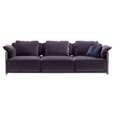 a purple couch with pillows on it