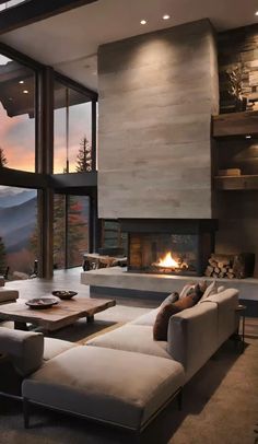 a living room with couches and a fire place in the middle of it's walls