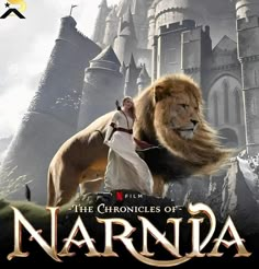 the chronicles of narnia movie poster with lion and man in front of castle