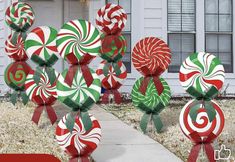 some candy canes are in front of a house