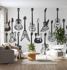 a living room with guitars on the wall