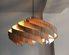 a wooden chandelier hanging from the ceiling