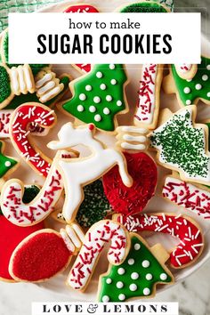 a plate full of decorated sugar cookies with the words how to make sugar cookies