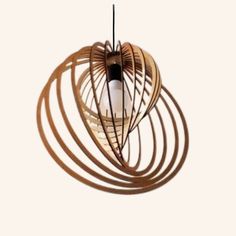 a wooden light fixture hanging from a ceiling