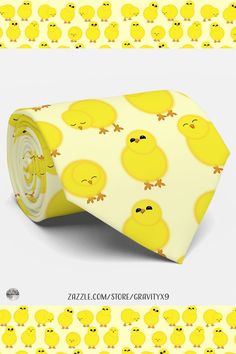 a yellow neck tie with small chicks all over it and the words, happy easter