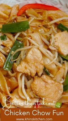 chicken chow mein with noodles and vegetables in a red bowl