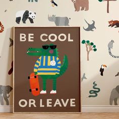 an animal themed children's room with wallpaper and a poster that says be cool or leave