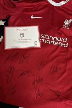 the liverpool united shirt signed by several players