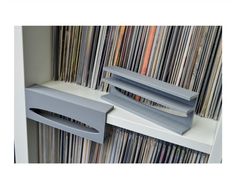 an image of a shelf with records on it