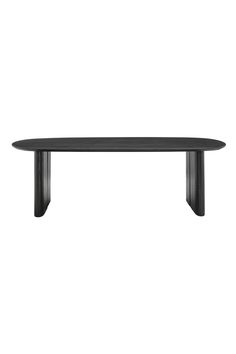 a black table sitting on top of a white wall