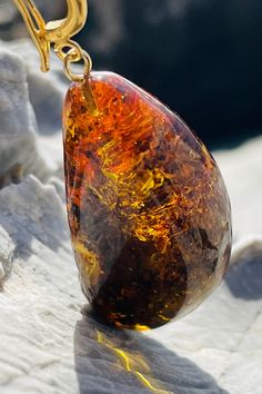 Pendant material and details : * Stone :Natural Baltic Amber with fossil moss * Type of Amber : Transparent  * Color of Amber : Honey , Green  * Metal : Sterling silver 925   * Pendant weight : 12 g * Pendant length with loop:  4,2 cm  * Amber dimensions : 3,6  * 2,1* 1,0 cm Green Metal, Amber Pendant, Natural Honey, Natural Amber, Baltic Amber, Moss Green, Sterling Silber, Fossil