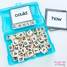 two plastic containers filled with scrabbles and words that spell out how to use them