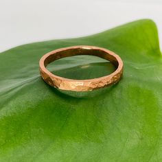 Copper Ring Size 13 Band Minimal Texture Hammered Solid Handcrafted Made USA Jewelry Unisex Large Finger Thumb ▪️New Care Instructions: Your one of a kind copper ring is sealed with a clear protective coating that should keep your jewelry shiny for awhile. It is normal for the copper to patina to a dark brown when protective sealant is worn away, but can be brought back to original luster with jewelry polishing compound and sealed with clear nail polish or metal jewelry sealant. When exposed to air, chemicals, and elements, copper will tarnish and darken naturally. After contact with human skin where it will interact with air, sweat, oils, and lotions, it can leave a harmless blue/green mark on the skin depending on your body's acidity. Finger thumb index pinkie boho unisex festival classi Minimal Texture, Coastal Jewelry, Bolo Necklace, Polishing Compound, Finger Jewelry, Clear Nail, Usa Jewelry, Hippy Gifts, Clear Nail Polish