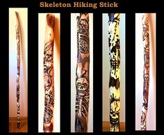 four different types of carved baseball bats with designs on them and the words skeleton hiking stick