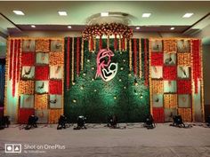 the stage is decorated with flowers and decorations