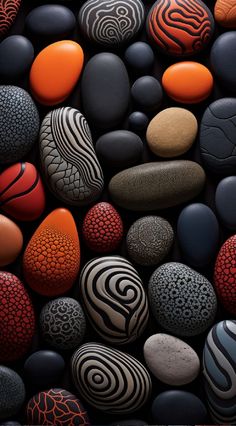 many different colored rocks are arranged together